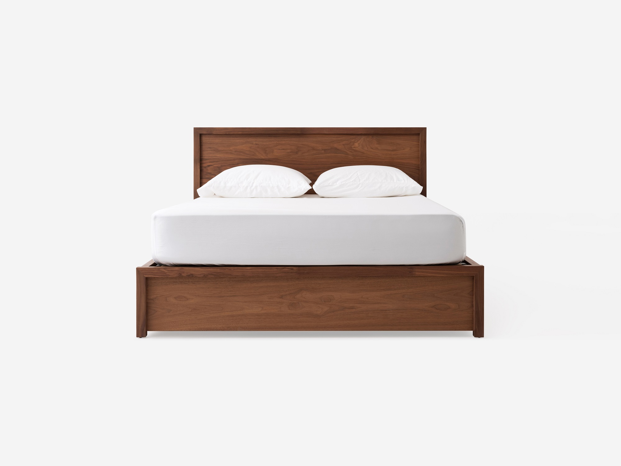 Front view of our Marcel drawer storage bed in walnut 